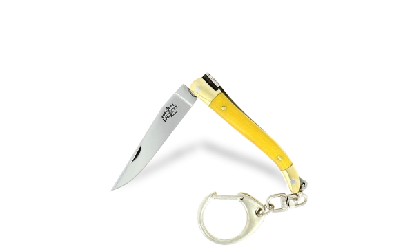 Couteau pliant 7cm en tissu compressé jaune avec porte-clé, mitres laiton finition brillante