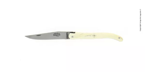 Couteau pliant ciselé main satiné en phacochère